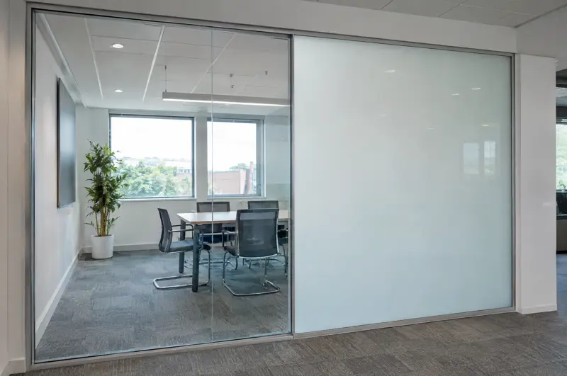 Switchable glass, one panel clear, one frosted. Switchable smart glass with one panel clear and one panel opaque (illustrative)